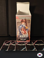 1x Boite VIDE Nivel Arena BT08 NIKKE Coréen + 10x Cartes Nivel Arena Aléatoires
